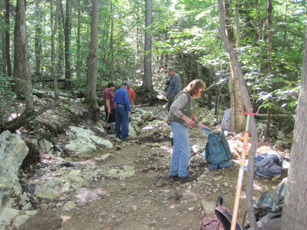 Members of the Presidential Gem and Mineral Society on a recent trip to the Randolph Town Forest crystal mine. 