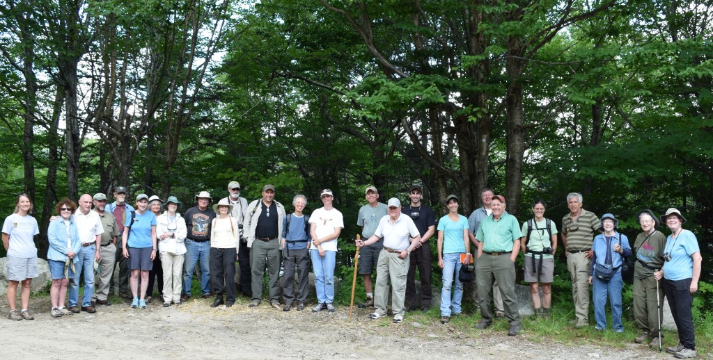 Many of the 35 participants in the Aug. 1 Randolph Community Forest Day tour posed for a photo in the parking lot near the Pond of Safety, located in Randolph some 5 miles from Route 2 on the Kilkenny Unit in Androscoggin Ranger District of the White Mountain National Forest. (Photo by Edith Tucker.)