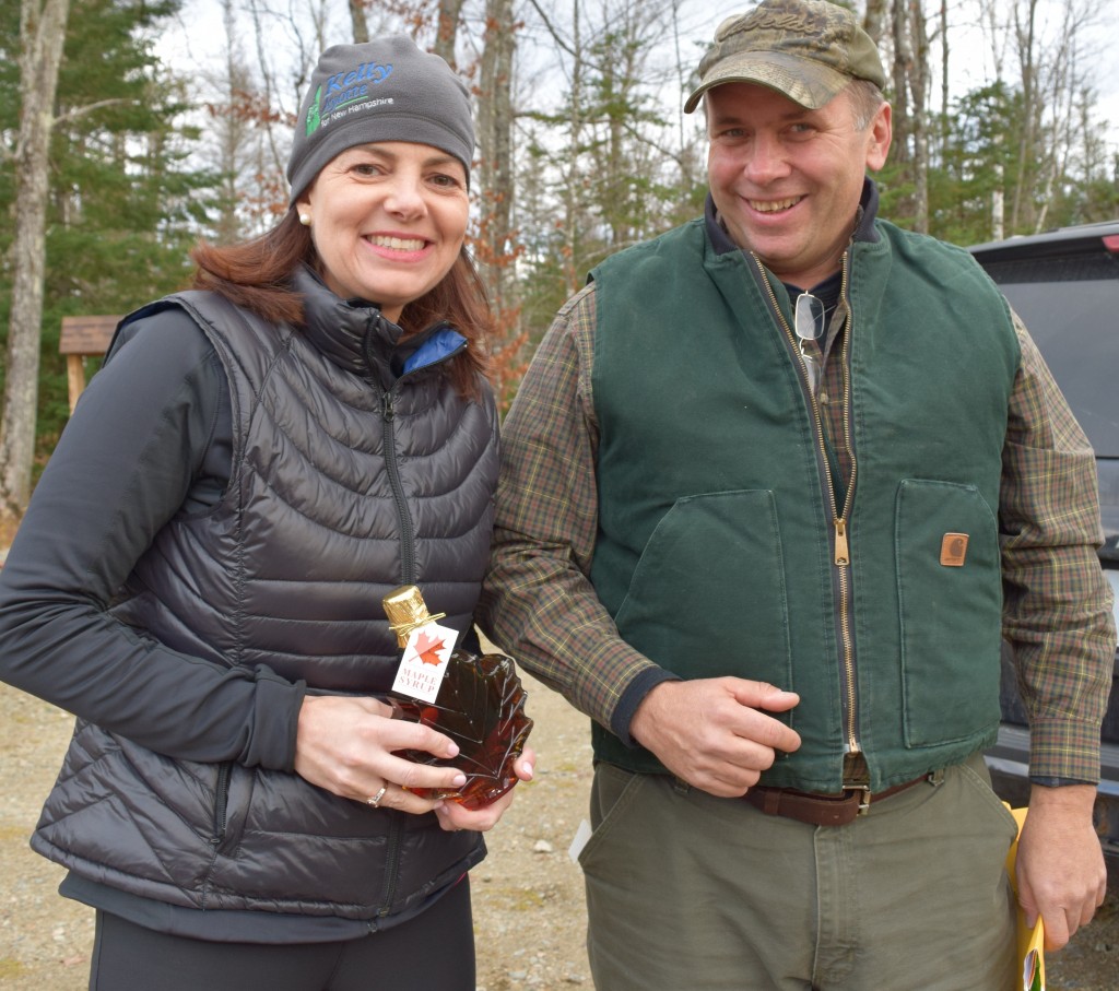 John Scarinza, Chair of the Randolph Community Forest Commission, presented US Senator Kelly Ayotte with maple syrup from his sugar bush. 