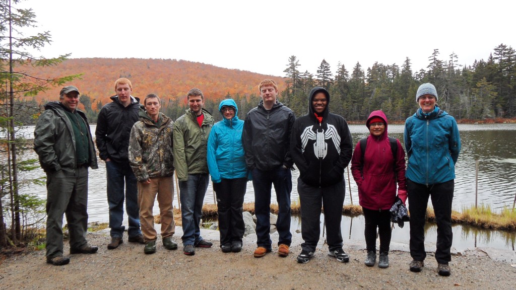 John Scarinza (left) and June Hammond Rowan (right) with Plymouth State University’s Land Conservation Techniques class at Pond of Safety.