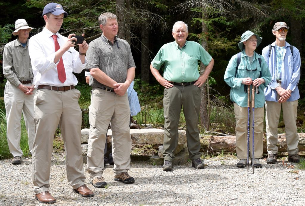 Those on hand at the new canoe access on Aug. 6 at the Pond of Safety in Randolph to thank retired USFS Androscoggin District Ranger Katie Stuart of Shelburne or her efforts were: George Dunham, left; Senator Woodburn’s campaign aide who is a senior at Woodsville H.S.; county forester Brendan Prusik and wildlife biologist John Lanier, both of Columbia, and Susan and Louis Kern. (Edith Tucker photo)